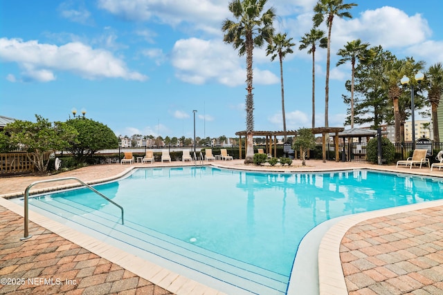 view of swimming pool with a gazebo and a pergola