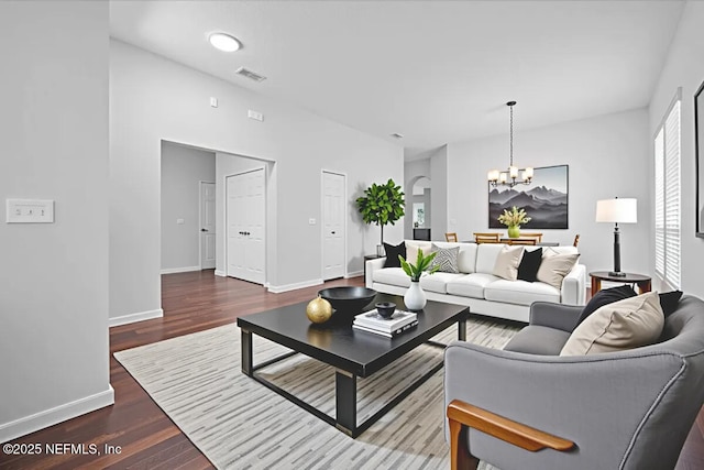 1560 Timber Trace Dr, Saint Augustine, FL 32092 - living room featuring a chandelier and wood finished floors