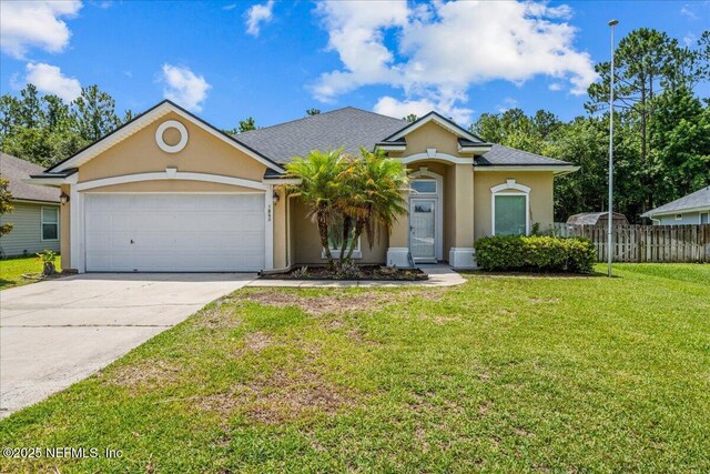 1560 Timber Trace Dr, Saint Augustine, FL 32092 - view of front of home featuring stucco siding, a garage, concrete driveway, and a shingled roof