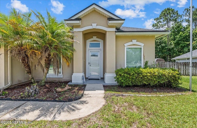 1560 Timber Trace Dr, Saint Augustine, FL 32092 - entrance to property featuring stucco siding