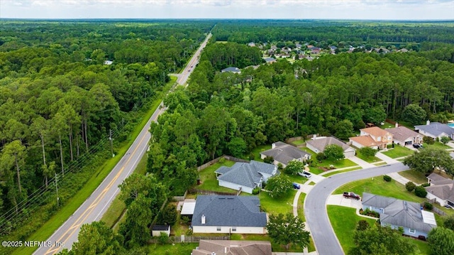 1560 Timber Trace Dr, Saint Augustine, FL 32092 - aerial view of residential area with a heavily wooded area