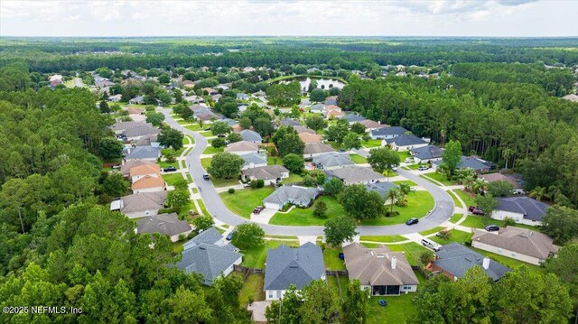 1560 Timber Trace Dr, Saint Augustine, FL 32092 - aerial perspective of suburban area with a forest
