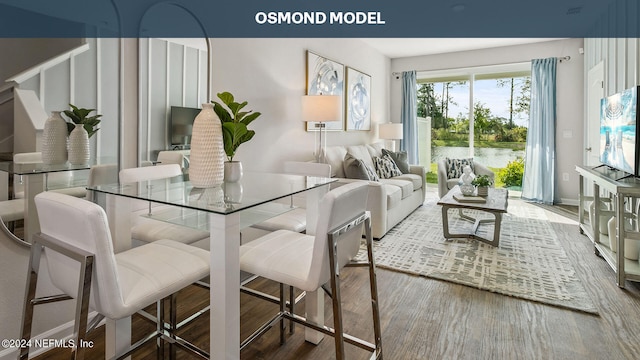 dining area with hardwood / wood-style flooring