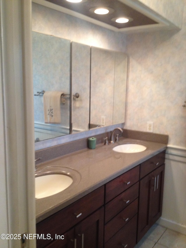 bathroom featuring vanity and tile patterned flooring