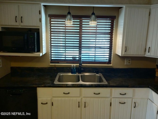 kitchen featuring black appliances, white cabinetry, pendant lighting, and sink