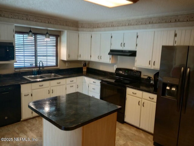 kitchen featuring sink, white cabinets, black appliances, and a center island