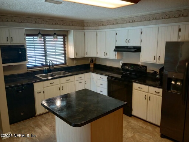 kitchen featuring sink, black appliances, and white cabinetry