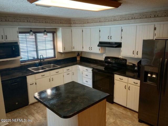 kitchen with black appliances, a center island, a textured ceiling, white cabinetry, and sink