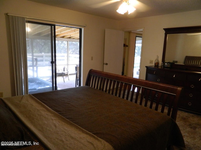 bedroom with ceiling fan and access to exterior