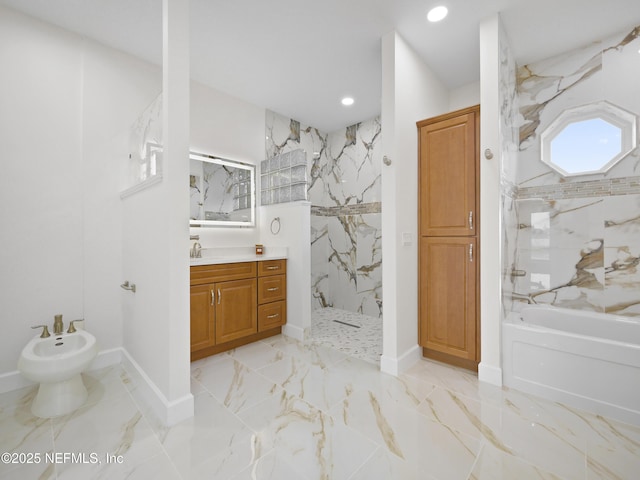 bathroom featuring a bidet, vanity, and independent shower and bath