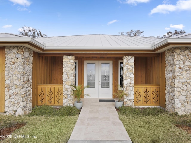 property entrance featuring french doors