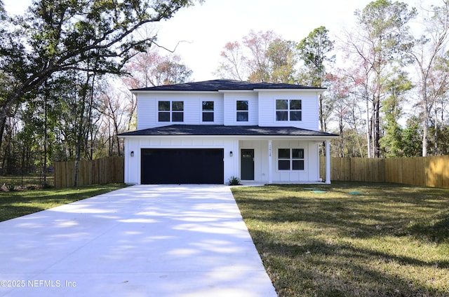 modern farmhouse style home featuring a garage and a front lawn