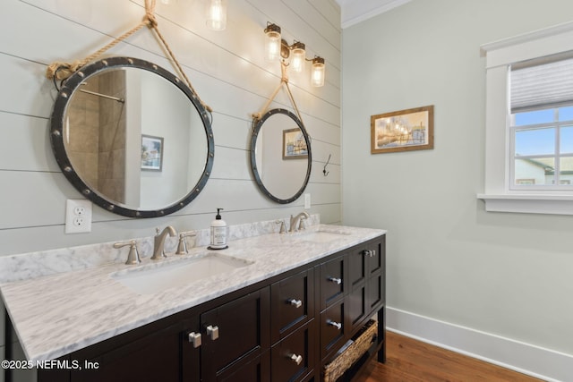 bathroom featuring hardwood / wood-style flooring and vanity