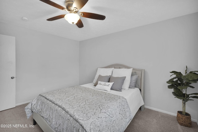 bedroom with ceiling fan and carpet flooring