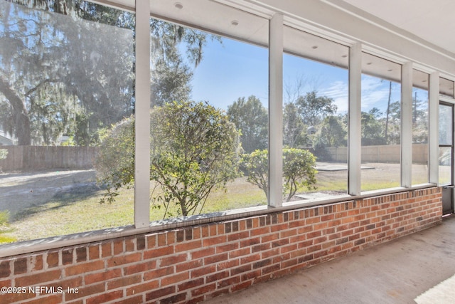 unfurnished sunroom featuring a healthy amount of sunlight