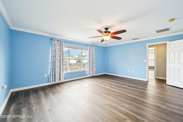 unfurnished room featuring ornamental molding, dark hardwood / wood-style floors, ceiling fan, and a textured ceiling