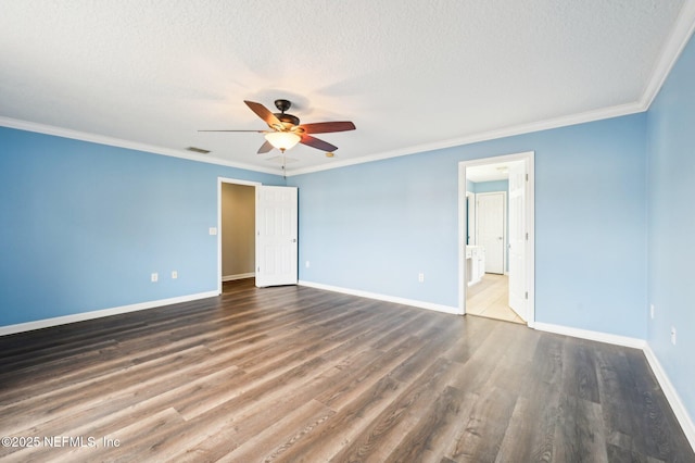 unfurnished bedroom with crown molding, dark wood-type flooring, and a textured ceiling