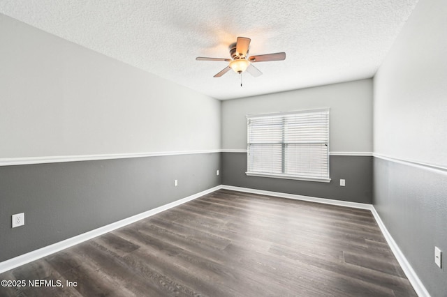 unfurnished room with ceiling fan, dark hardwood / wood-style floors, and a textured ceiling