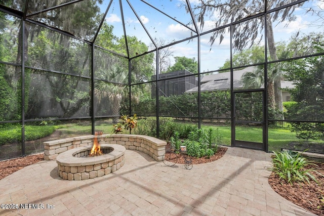 view of patio / terrace with an outdoor fire pit