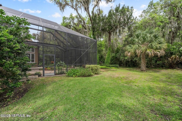 view of yard with a lanai