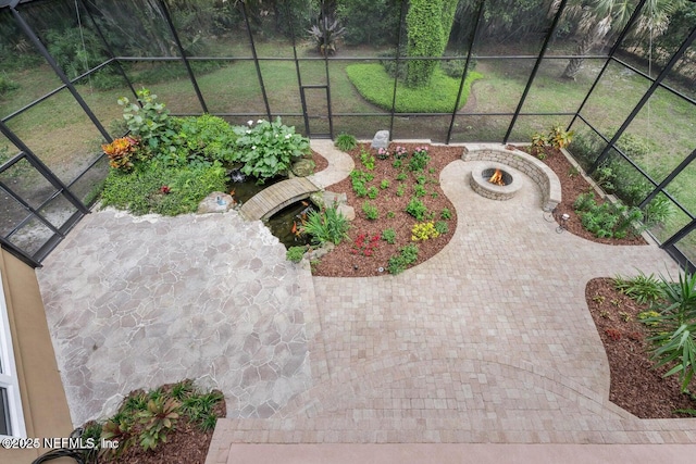 view of yard with a patio area and a fire pit