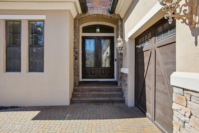 doorway to property featuring french doors