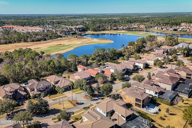 drone / aerial view with a water view