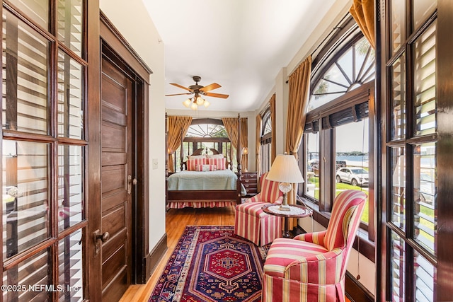 bedroom with hardwood / wood-style floors