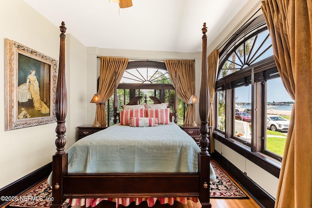 bedroom featuring ceiling fan and hardwood / wood-style floors