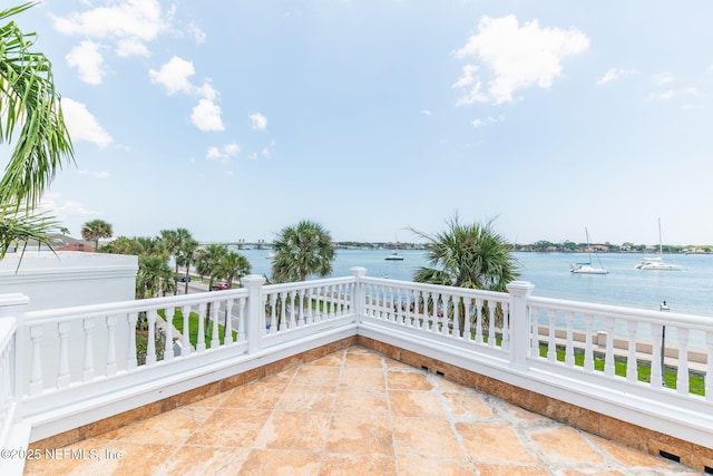 view of patio / terrace with a water view