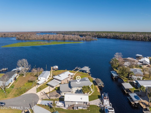 bird's eye view with a water view