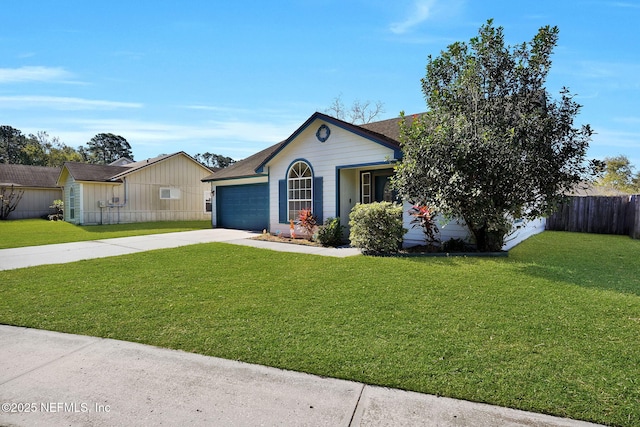 ranch-style house with a garage and a front lawn