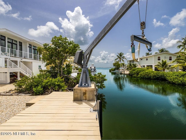 view of dock with a water view