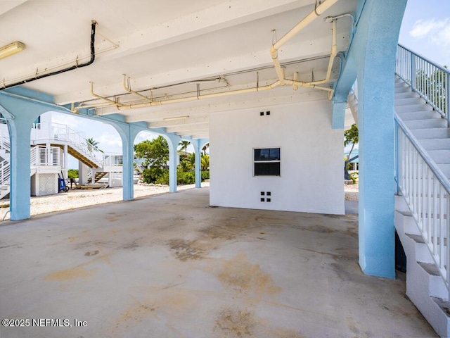 garage featuring a carport