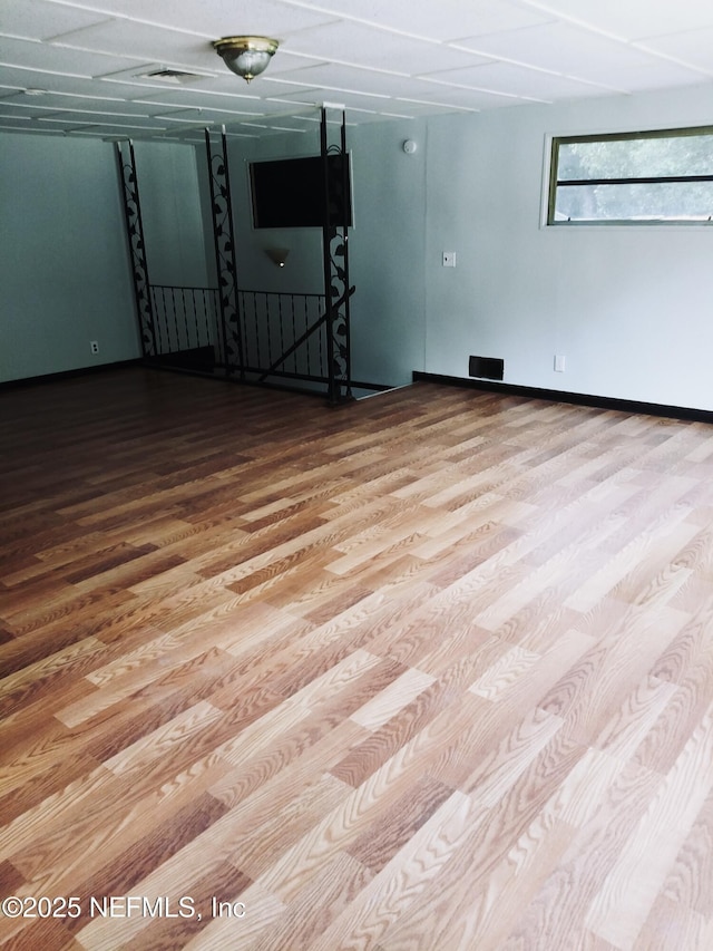 spare room with light wood-type flooring