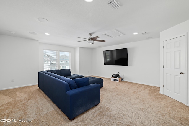 living room with visible vents, baseboards, attic access, carpet flooring, and recessed lighting