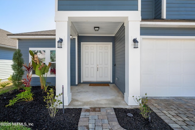 entrance to property with a garage