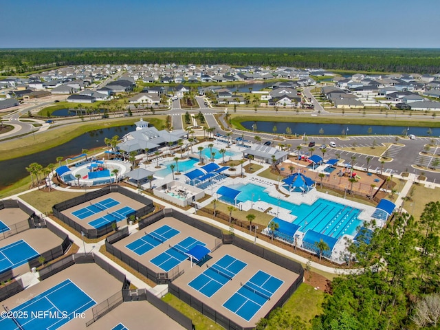 bird's eye view with a residential view and a water view