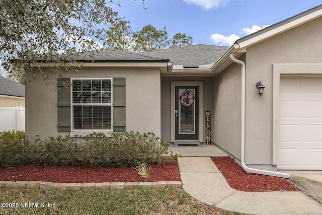 entrance to property with a garage