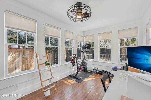 workout area featuring wood-type flooring