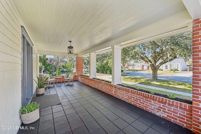 view of patio featuring covered porch