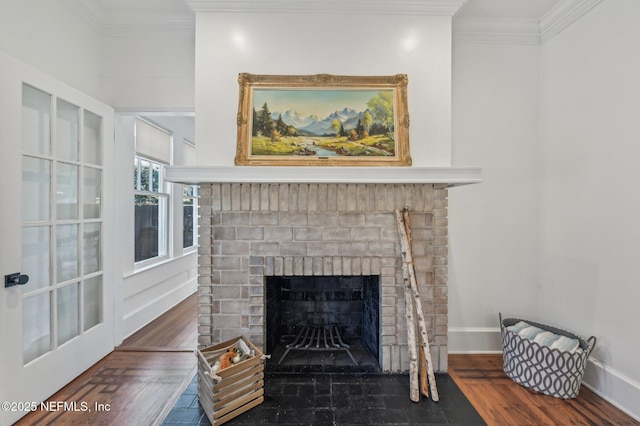 details with a fireplace, crown molding, and wood-type flooring