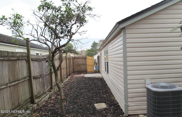 view of yard featuring central AC