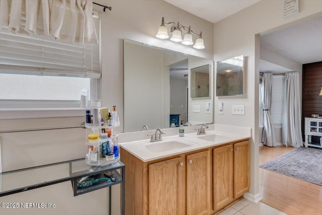 bathroom featuring vanity and tile patterned flooring