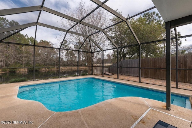 view of pool with a lanai and a patio