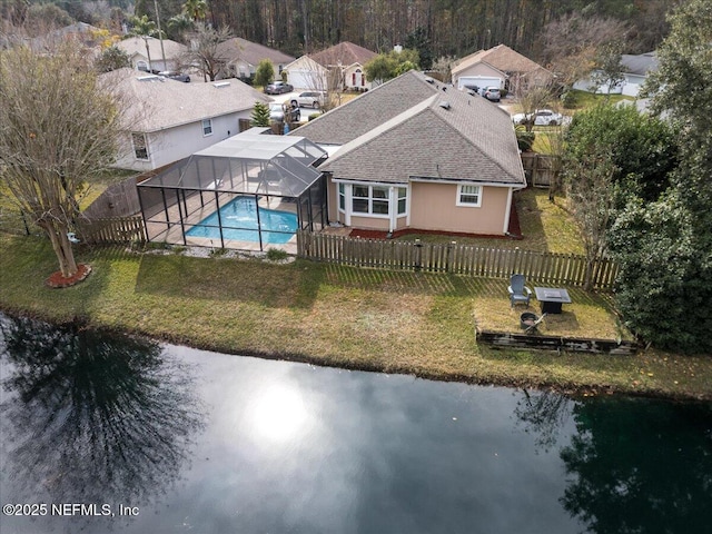 birds eye view of property featuring a water view