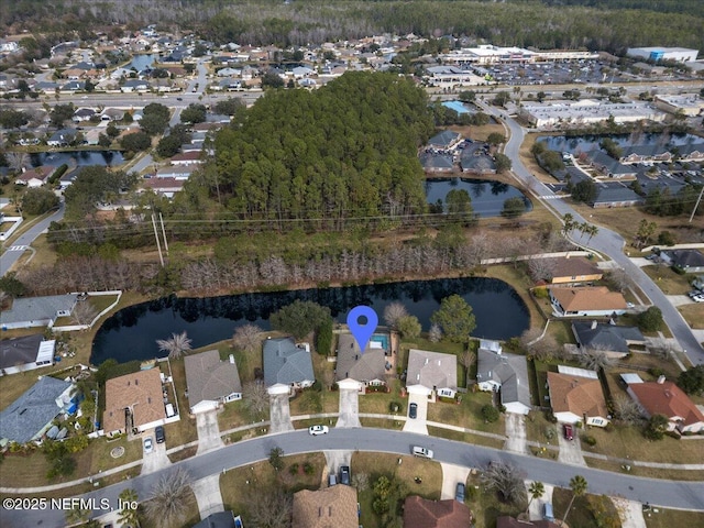 bird's eye view with a water view