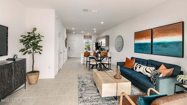 living room featuring light tile patterned flooring