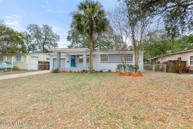 single story home with a porch and a front lawn