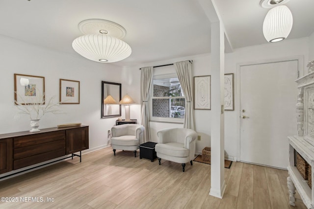 living area featuring light hardwood / wood-style floors